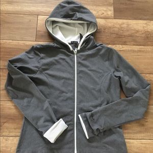 Gray and white Champion elite jacket